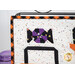 A super close up on one of the purple and black candy blocks, showing fabric colors and top stitching details.