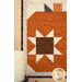 A close up on the leftmost pumpkin, showcasing the quilting star and fabric details.