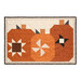The completed Pumpkin Patch Trio kit colored in the rich fall colors of the Midnight Moon collection from Andover Fabrics, isolated on a white background.