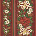 Border stripe fabric featuring garlands of poinsettias, white ribbons, mistletoe, and holly on ruby red fabric.