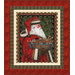 A quilt showcasing a panel of Santa holding Noah's ark, surrounded by holly leaves and classic holiday prints.