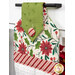 An angled shot of the top of the hanging towel, demonstrating fabric colors and details on the fabric button.