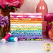 A stack of the fabrics included in the Felicity Fat Quarter Bundle, with flowers and jars and thread.