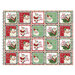 Fabric featuring cheerful Santa Claus stamps with holiday phrases on a white, green, and red grid background.