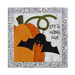 The completed On Wander Lane Mini Quilt for October, an appliqué pumpkin and bat beside hand-stitched text that reads 