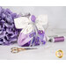 Image of the back of the angel, showing silver ribbons with color coordinated sewing clips