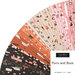 A fanned collage of the Halloween fabrics included in the Purrs and Boo Jelly Roll.