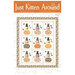 The front of the Just Kitten Around quilt pattern, showcasing a digital image of the completed quilt on a white, topstitched background.