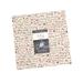 A layer cake featuring festive words like Joy, Peace, and Christmas with a label saying Chilly..