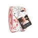 A photograph of the Jelly Roll with a white ribbon and Moda tags