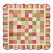 The completed Holiday Charm quilt, colored in red, green, and cream fabrics from the Buon Natale collection by Moda Fabrics, isolated on a white background.
