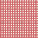 Swatch of ivory fabric with an bright red gingham print