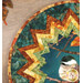 A stylized close up on the topper showing print and top quilting details on the panel featuring vibrant autumn leaves and an adorable chickadee.