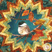 A super close up on the center of the topper showing print and top quilting details on the panel featuring vibrant autumn leaves and an adorable chickadee.
