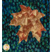 A super close up on one of the brown appliqué leaves, demonstrating fabric colors, prints, and top stitching details.