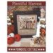 The front of the Plentiful Harvest pattern, showing an example of the completed pattern, mounted and surrounded by coordinating decor. 