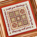 A close up photograph of the finished cross stitch project.