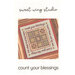 Cross-stitch design featuring the phrases 