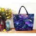 A Playing with Panels Market Tote colored in navy, magenta, and cyan dragonfly-themed fabric, staged with coordinating decor.