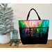 A Playing with Panels Market Tote colored in multicolor aurora and forest-themed fabric, staged with coordinating decor.