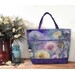 A Playing with Panels Market Tote colored in fabric showcasing ethereal dandelions and flowers, staged with coordinating decor.