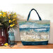 A Playing with Panels Market Tote colored in blue and sandy tan beach-themed fabric, staged with coordinating decor.