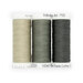 Three spools of thread in cream, gray, and dark gray, isolated on a white background.