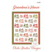 Front of the Grandma's House quilt pattern featuring geometric houses and stars on a white background.