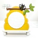 The fully assembled and painted Bee Hive Cross Stitch Display, staged on a white tabletop.