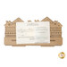 The unfinished and disassembled Tiny Town Rooftops Cross Stitch Display in its packaging, isolated on a white background.