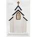 The fully assembled and painted City Chapel Cross Stitch Display Backer, staged on a white tabletop.