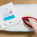 Image of the Perfect Embroidery Press Cloth being used to press a project.