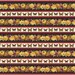 Border print fabric with strips of black with orange and yellow florals, red stripes, and cream stripes with monarch butterflies