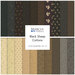 Collage of fabrics in the collection in neutrals, black, gray, tan, and cream, featuring primitive patterns