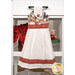The Hanging Towel, colored in white and red spotted fabrics from the Merry Gnome-ments collection, staged on a white kitchen drawer with coordinating decor.