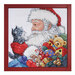 Colorful cross-stitch design depicting Santa Clause holding a striped kitten inside a frame.