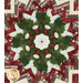 A top down close up on the center of the topper demonstrating fabric colors and details on the kaleidoscope snowman fabric.