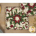 A stylized shot of the square hot pad, demonstrating details on the festive snowman fabrics.