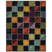 The completed Half-Square Triangle Flannel Rag Quilt, colored in contrasting black and a rainbow of flannels in the Woolies Flannels collection, isolated on a white background.