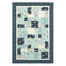 The Easy as ABC and 123 Crib Quilt featuring a patchwork design in winter flannel fabrics like blue, navy blue, teal and white, isolated on a white background. 