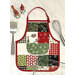 A completed Apron Casserole Hot Pad in Christmas themed fabrics beside a spatula and whisk.