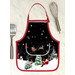 A completed Apron Casserole Hot Pad in holiday baking themed fabrics beside a spatula and whisk.