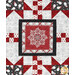 A head-on shot of one of the blocks, showing details on a red and gray snowflake panel block and surrounding patchwork.