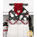 A head-on close up at the top of the hanging towel, showing details on the black fabric with snowmen and red fabric tab.