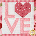 A head-on close up of the center "LOVE" block, demonstrating piecing details as well as fabric colors and prints.