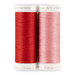 Two spools of red and pink thread, isolated on a white background.