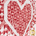 A stylized shot of the heart outline on the quilt, demonstrating fabric and piecing details.