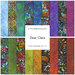 A collage of fabrics included in the Dear Clara collection with a rainbow of colored fabrics with a stained glass theme.