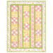 A shot of the completed Patchwork Baby Quilt kit colored in pink, green, and yellow fabrics from the Bundle of Joy flannel collection, isolated on a white background. 