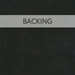A swatch of black flannel fabric with a transparent banner over the top that reads "Backing."